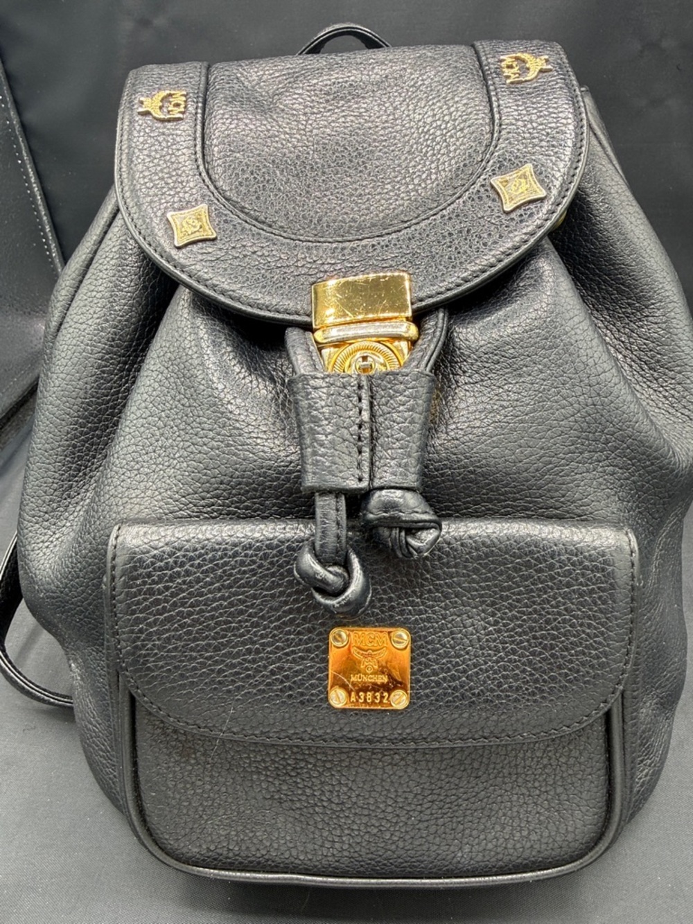 MCM Black Pebbled Leather Backpack with Gold Accents. Mini Preloved